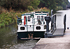<b><i>Le bateau Boldus fait son entrée sur le Canal de Roubaix en 2009.</b></i><br/>Photographie en couleur (Crédit : Fleuves et Canaux)